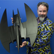 Light up Batwing. $100, in stores October. Bearded gentleman in snazzy Bat-logo jacket not included.